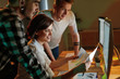 © puhhha - Programmers Working On Software In Office