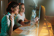 © puhhha - Programmers Writing Software For Website On Holographic Screen