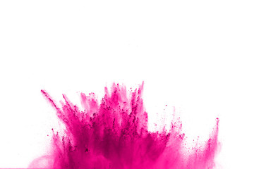 Wall Mural - Abstract pink dust explosion on white background. abstract colored powder splatted on white background, Freeze motion of pink powder exploding.