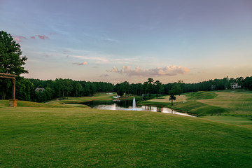 Wall Mural - Golf Course with Pond and Water Fountain