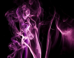 Purple smoke on black background