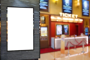 blank showcase billboard or advertising light box for your text message or media content with blurred image of ticket sales counter at movie theater, advertisement, marketing, entertainment concept