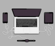 Mobile phone, tablet pc and smart watch connected to laptop computer