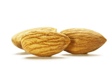 Wall Mural - Almonds isolated on white background