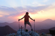 © Curto - Hiker woman watching the sunset