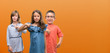 © Krakenimages.com - Group of boy and girls kids over orange background with surprise face pointing finger to himself