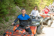 man riding atv vehicle on off road track ,people outdoor sport activitiies theme