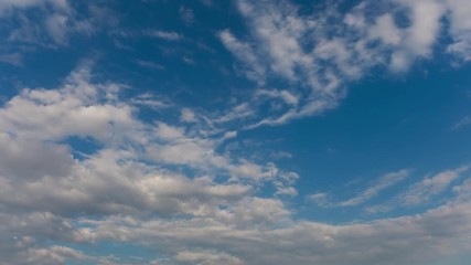 Wall Mural - Blue sky with flying clouds, professional shoot, no birds, no flicker.