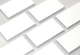 Fototapeta Przestrzenne - Blank Business Cards on gray background. Mock-up for branding identity. 3d rendering.