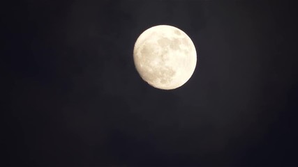 Wall Mural - Big full moon behind moving clouds time lapse in 4K 
