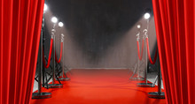 Red Carpet, Rope Barriers And Spot Lights Behind Curtains Indoors