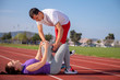 © blicsejo - Man helps to woman with injured knee at sport activity