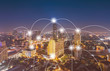 © Pawinee - Aerial view of digital technology over cityscape, Can use for connection network concept background.