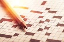 Crossword Puzzle And Pencil