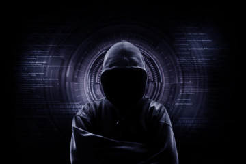 internet crime concept. hacker working on a code on dark digital background with digital interface a