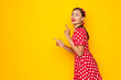 © fotofabrika - portrait of a beautiful woman pinup retro style pointing