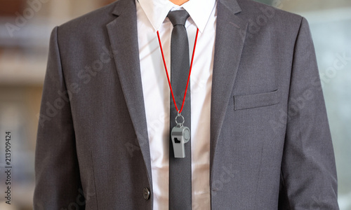 Cuadros en Lienzo Man in suit wearing a whistle with red string. 3d illustration