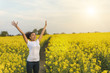 © Darren Baker - Mixed Race African American Girl Teenager Celebrating In Yellow Flowers
