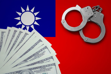 Wall Mural - Taiwan flag  with handcuffs and a bundle of dollars. The concept of illegal banking operations in US currency