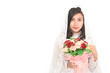 © vipubadee - Portrait of beautiful asian  woman wearing wedding dress isolated on white background. Free from copy space.