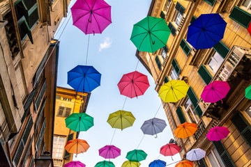 Sticker - Salita Santa Caterina, Genoa, colored umbrellas over the street