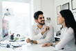 © NDABCREATIVITY - Picture of handsome man and woman as business partners