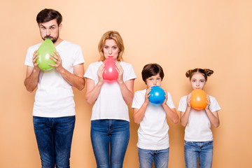 Sticker - Young family, bearded father, blonde mother, boy and girl wearing blue jeans and white T-shirts, standing in odrer of hierarchy, blowing air balls, looking suspiciously