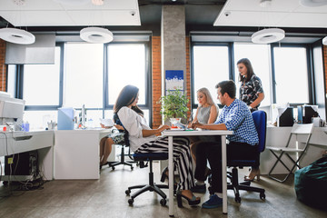 Wall Mural - business team working in the office sitting at the table
