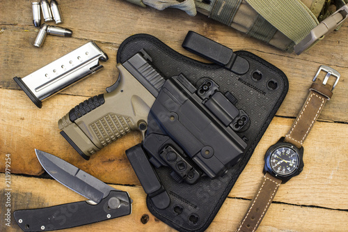 Fotografía Tactical Handgun and Gear including Watch, Bullets, Knife, Holster, Bag