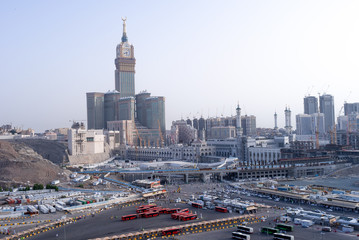 Wall Mural - MECCA, SAUDI ARABIA - MAY 07 2018: Amazing panoramic view from a rock on the Abraj Clock Tower and skyscrapers complex, Masjid Al Haram or Grand Mosque is also visible on right side. Best for print