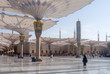 MEDINA, SAUDI ARABIA - APRIL 28 2018: These Umbrella construction on the square of Al-Masjid An-Nabawi or Prophet Muhammed Mosque are protecting people from sun at daytime and work as lights at night