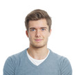 © Axel Bueckert - smiling young man looking pleased positive expression