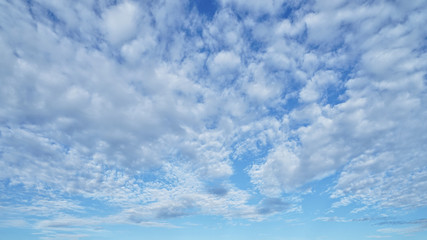 Fluffy clouds and blue sky