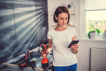 Wall Mural - Woman using smart phone