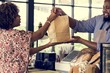 © Rawpixel.com - Black customer buying bakery products