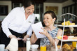 © Rawpixel.com - Woman ordering from a menu
