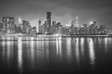 Fototapeta Miasto - Black and white picture of Manhattan at night, New York City, USA.
