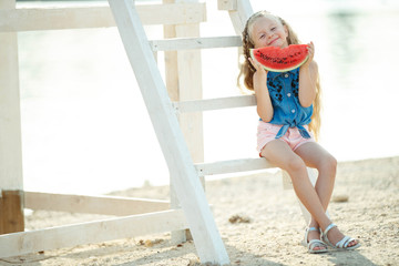 Child with watermelon 
