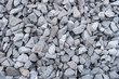 Crushed stones texture background use for construction work. Grey granite gravel texture background, close up.