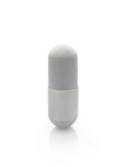 One pill on white background