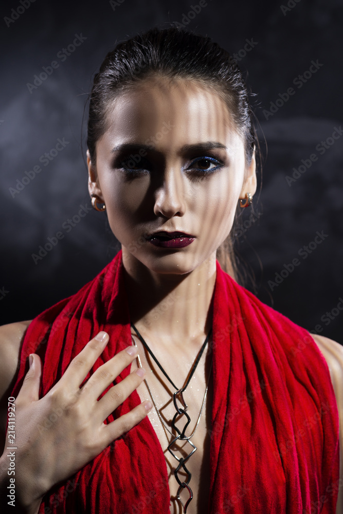 Beautiful brunette topless girl model, covering her naked breast with a