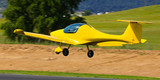 Fototapeta Dinusie - Picture of small sports airplane  at the sport airport