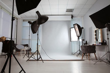 Interior Of Modern Photo Studio With Professional Equipment