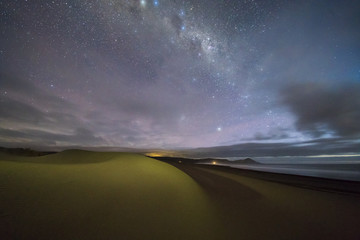 Wall Mural - the milky way rises below the horizon at 