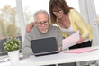 © thodonal - Senior couple checking financial document