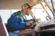 © ADDICTIVE STOCK - Stylish man driving vintage van