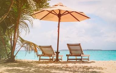 beach chairs on the tropical beach