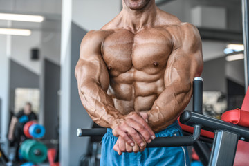  Brutal aged strong bodybuilder athletic men pumping up muscles with dumbbells