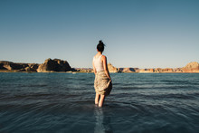 Girl Wading In The Water