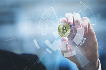 bitcoin with business man and graphic interface